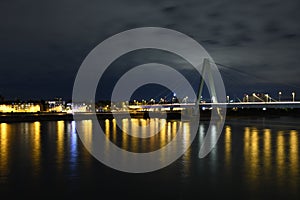 Severinsbrucke and the Rhine at night in Cologne, Germany