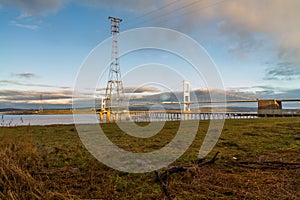 Severn Bridge in morning light with pylon in the foreground.