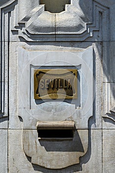 Sevilla spelled on a bronze plaque