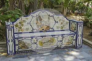 seville, bank beautiful painted tile pieces in Marbella, Andaluc photo