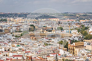 Seville city skyline and the plaza de toros de la Real Maestranza de Caballeria de Sevilla photo