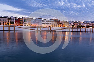 Seville, Spain, Night view of the fashionable and historic districts of Triana