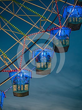 Seville, Spain - April 23, 2015: Detail of ferris wheel illuminated at night