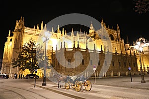 SEVILLE, SPAIN - JUNE 13, 2018: night view of Seville Cathedral illuminated, Spain