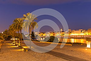 Seville, Spain, night view, riverside boulevard and a place for meetings and recreation