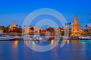 Seville sunset skyline torre del Oro and Giralda