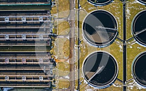 Sewage farm. Static aerial photo looking down onto the clarifying tanks. Industrial place. Geometric background texture. Photo