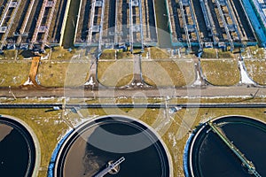 Sewage farm. Static aerial photo looking down onto the clarifying tanks. Industrial place. Geometric background texture. Photo