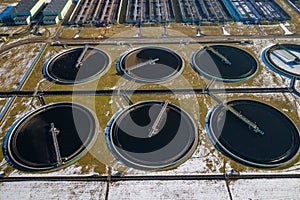 Sewage farm. Static aerial photo looking down onto the clarifying tanks. Industrial place. Geometric background texture. Photo