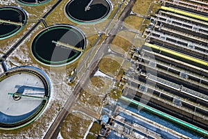 Sewage farm. Static aerial photo looking down onto the clarifying tanks. Industrial place. Geometric background texture. Photo