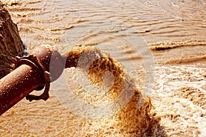 Sewage flowing from a pipe