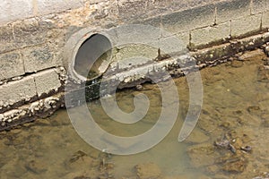 Sewage pipe water and river pollution (PJSR_A5940)