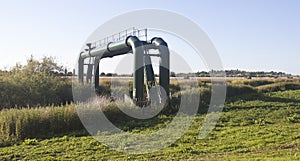 Sewage pipes over a river