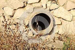 A sewage pouring hole in wall