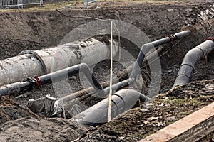 Sewage and water pipes being prepared for a new crossing pipe