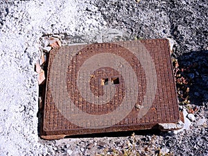 Sewer cover badly placed photo