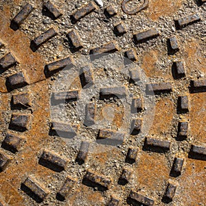 Sewer cover metal texture