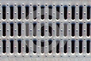 The Sewer Grate from drain on the roadside. Sewage channel