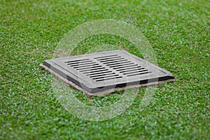 Sewer grate on the lawn - drainage for heavy rain