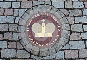 Sewer hatch on a stone pavement