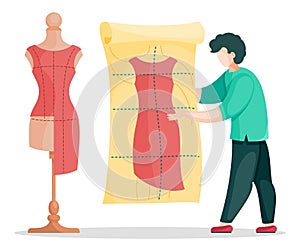 Sewer man or designer holding tailor dress pattern standing near mannequin with unfinished dress