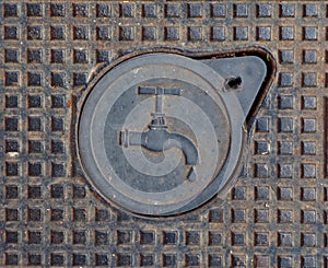 Sewer manhole with faucet pattern and water drop, water supply, forged metal grate