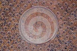 Sewer metallic cover texture with stars