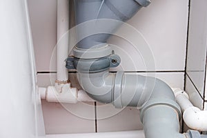 Sewer pipes in home, connection of grey polipropilen pipes for wash basin, washbowl drain