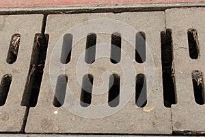 Sewer System Concrete Road Grid Grate Blocks For Drain Rain Water Photo Shot.