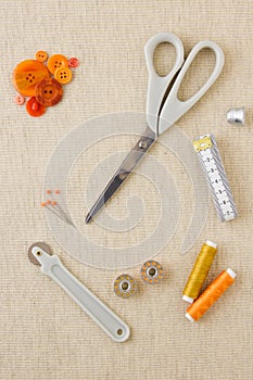 Sewing accessories in orange tones