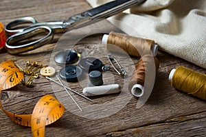 Sewing accessories on wooden table