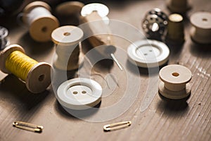 Sewing accessories on wooden table