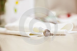 Sewing accessories on a wooden table close-up