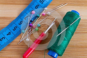 Sewing accessories on wooden table