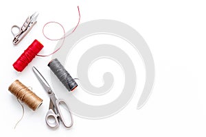 Sewing background with tailor and knitting accessories. Tailoring scissors