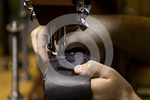 Sewing a Box Stitch on Black Leather