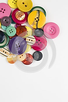 Sewing buttons background. Colorful sewing buttons