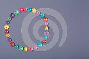 Sewing buttons composition. Needlework concept background. Flat lay