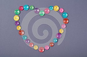 Sewing buttons composition. Needlework concept background. Flat lay