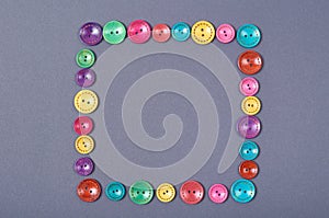 Sewing buttons composition. Needlework concept background. Flat lay