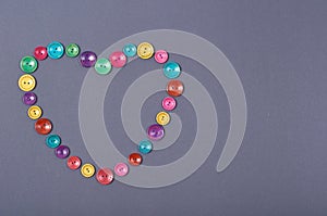 Sewing buttons composition. Needlework concept background. Flat lay