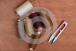 Sewing essentials on red background