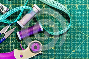 Sewing hobby. Top view of sewing accessories with needles