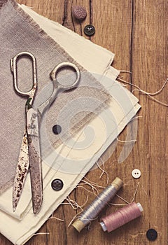 Sewing kit. Scissors, bobbins with thread and
