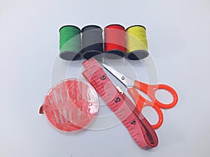 Sewing kit tools on white background