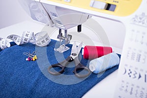 Sewing Machine, Accessories For Sewing And Jean Cloth.