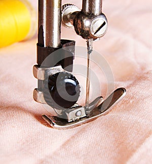 The sewing machine close-up.