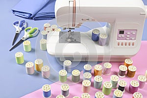 Sewing machine and colorful thread rolls for sewing on two tone