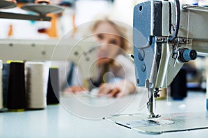 Sewing machine on factory, closeup