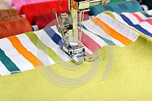 Sewing machine and item of clothing material